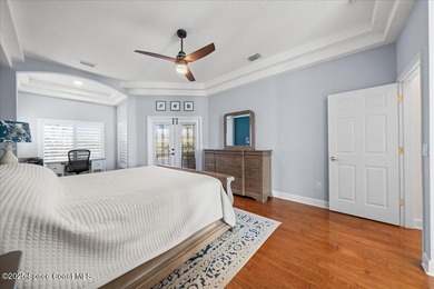 Step into this beautifully maintained pool home in the coveted on Viera East Golf Club in Florida - for sale on GolfHomes.com, golf home, golf lot