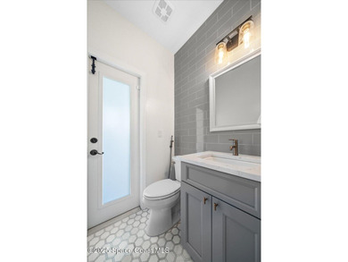 Step into this beautifully maintained pool home in the coveted on Viera East Golf Club in Florida - for sale on GolfHomes.com, golf home, golf lot