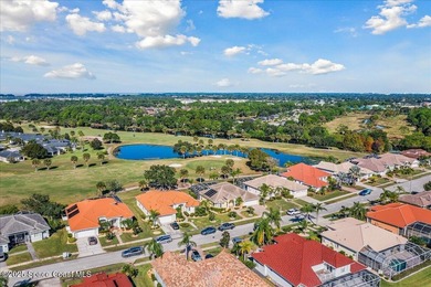 Step into this beautifully maintained pool home in the coveted on Viera East Golf Club in Florida - for sale on GolfHomes.com, golf home, golf lot