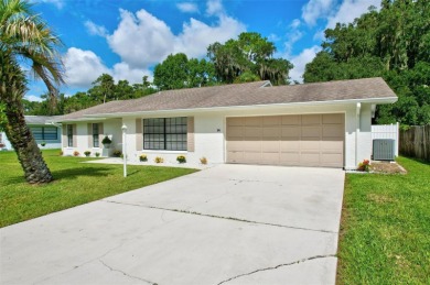 Under contract-accepting backup offers. SELLER MOTIVATED! WILL on Palm Harbor Golf Club in Florida - for sale on GolfHomes.com, golf home, golf lot