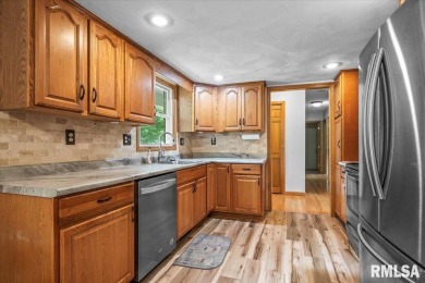 Tucked away on a quiet cul-de-sac just 5 minutes south of Auburn on Edgewood Golf Course in Illinois - for sale on GolfHomes.com, golf home, golf lot