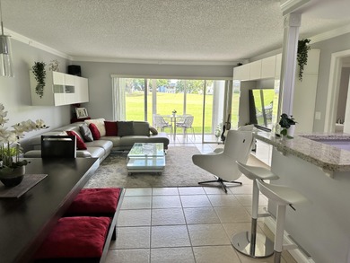 Sophisticated First-Floor Condo with Exceptional Golf view on Kings Point Golf -Flanders Way in Florida - for sale on GolfHomes.com, golf home, golf lot