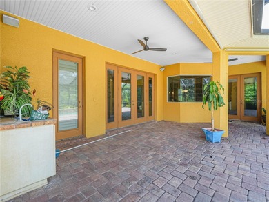 Elegant cul-de-sac home with pool, lake, and nature preserve on The Club at Eaglebrooke in Florida - for sale on GolfHomes.com, golf home, golf lot