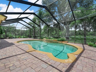 Elegant cul-de-sac home with pool, lake, and nature preserve on The Club at Eaglebrooke in Florida - for sale on GolfHomes.com, golf home, golf lot