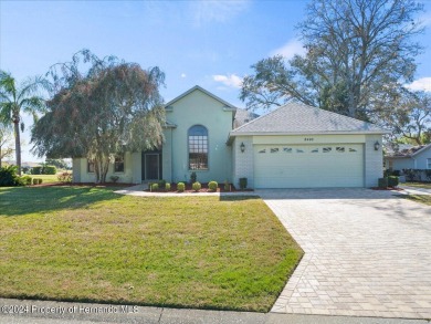 Situated on a large .34 corner lot, this beautifully landscaped on Glen Lakes Country Club in Florida - for sale on GolfHomes.com, golf home, golf lot