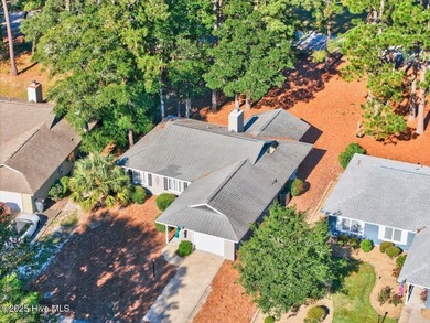 Discover this pristine 3-bedroom, 2-bath home located in the on Sea Trail Golf Resort in North Carolina - for sale on GolfHomes.com, golf home, golf lot