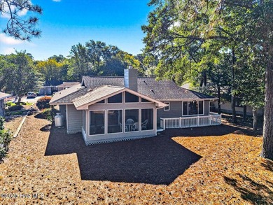 Discover this pristine 3-bedroom, 2-bath home located in the on Sea Trail Golf Resort in North Carolina - for sale on GolfHomes.com, golf home, golf lot