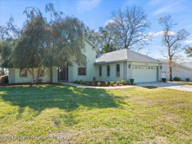 Situated on a large .34 corner lot, this beautifully landscaped on Glen Lakes Country Club in Florida - for sale on GolfHomes.com, golf home, golf lot