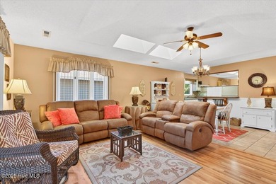 Discover this pristine 3-bedroom, 2-bath home located in the on Sea Trail Golf Resort in North Carolina - for sale on GolfHomes.com, golf home, golf lot