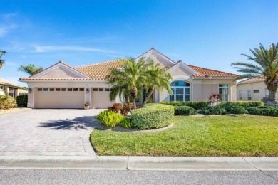 Under contract-accepting backup offers. This MAGNIFICENT home is on Pelican Pointe Golf and Country Club in Florida - for sale on GolfHomes.com, golf home, golf lot