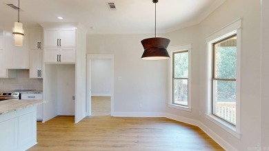 Located in an upscale cul-de-sac, this elegant home sits on a on Persimmon Ridge Golf Club in Arkansas - for sale on GolfHomes.com, golf home, golf lot