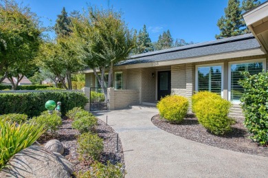 Enjoy this exceptionally updated home just steps from the San on San Joaquin Country Club in California - for sale on GolfHomes.com, golf home, golf lot