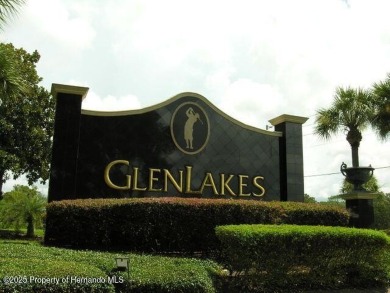 Paradise found in gated Glen Lakes golf course community! This on Glen Lakes Country Club in Florida - for sale on GolfHomes.com, golf home, golf lot