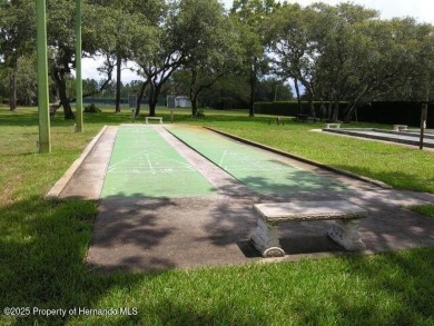 Paradise found in gated Glen Lakes golf course community! This on Glen Lakes Country Club in Florida - for sale on GolfHomes.com, golf home, golf lot