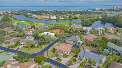 Immerse yourself in the timeless charm of West Indies-style on Longboat Key Golf Club Resort in Florida - for sale on GolfHomes.com, golf home, golf lot