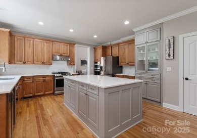 Discover an all-brick executive home perfectly situated on the on River Run Country Club in North Carolina - for sale on GolfHomes.com, golf home, golf lot