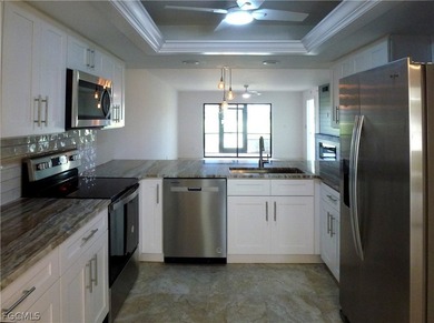 This 2 bedroom with a den 2 bathroom condo on the 1st floor is on  in Florida - for sale on GolfHomes.com, golf home, golf lot