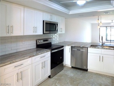 This 2 bedroom with a den 2 bathroom condo on the 1st floor is on  in Florida - for sale on GolfHomes.com, golf home, golf lot