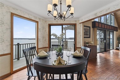 Timeless Tudor elegance meets effortless lake living in this on The Club At Porto Cima in Missouri - for sale on GolfHomes.com, golf home, golf lot