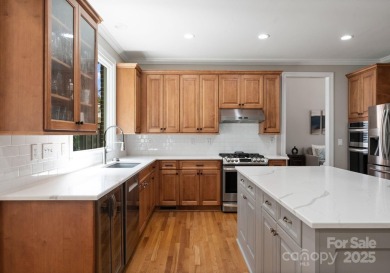 Discover an all-brick executive home perfectly situated on the on River Run Country Club in North Carolina - for sale on GolfHomes.com, golf home, golf lot