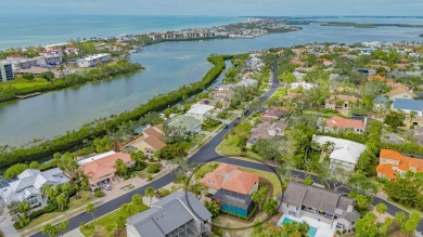 Immerse yourself in the timeless charm of West Indies-style on Longboat Key Golf Club Resort in Florida - for sale on GolfHomes.com, golf home, golf lot