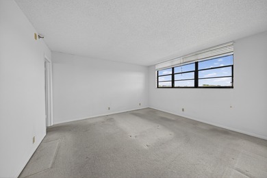 Enjoy golf course living in Deer Creek--a golf community with no on Deer Creek Golf Club in Florida - for sale on GolfHomes.com, golf home, golf lot