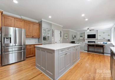 Discover an all-brick executive home perfectly situated on the on River Run Country Club in North Carolina - for sale on GolfHomes.com, golf home, golf lot