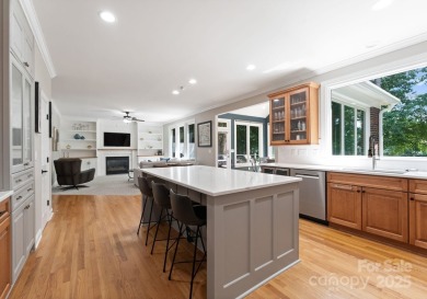 Discover an all-brick executive home perfectly situated on the on River Run Country Club in North Carolina - for sale on GolfHomes.com, golf home, golf lot