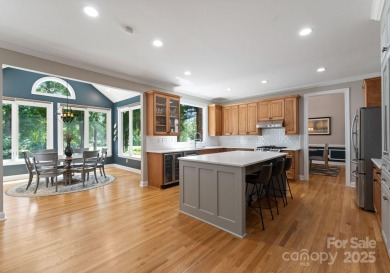 Discover an all-brick executive home perfectly situated on the on River Run Country Club in North Carolina - for sale on GolfHomes.com, golf home, golf lot
