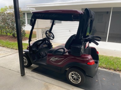 THIS SPECTACULAR 2/2 WITH A 12 X 24 SCREEN ROOM IS SELLING FOR on Lake Henry Golf Club in Florida - for sale on GolfHomes.com, golf home, golf lot