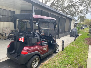 THIS SPECTACULAR 2/2 WITH A 12 X 24 SCREEN ROOM IS SELLING FOR on Lake Henry Golf Club in Florida - for sale on GolfHomes.com, golf home, golf lot