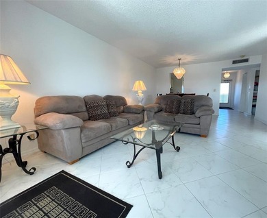 Welcome to this spacious and beautifully appointed on  in Florida - for sale on GolfHomes.com, golf home, golf lot