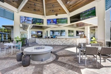 This tastefully updated and furnished end unit 3 bedroom condo on Pelican Sound Golf and River Club in Florida - for sale on GolfHomes.com, golf home, golf lot