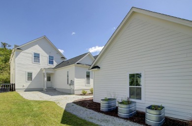 Nestled in the heart of the Village subsection of Summers Corner on Legend Oaks Plantation Golf Club in South Carolina - for sale on GolfHomes.com, golf home, golf lot