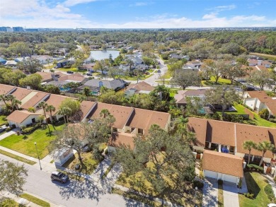 Welcome to popular Feather Cove! Rarely available 3 bedroom, 2 on Feather Sound Country Club in Florida - for sale on GolfHomes.com, golf home, golf lot