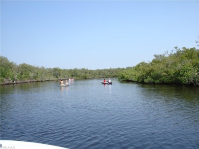 This tastefully updated and furnished end unit 3 bedroom condo on Pelican Sound Golf and River Club in Florida - for sale on GolfHomes.com, golf home, golf lot