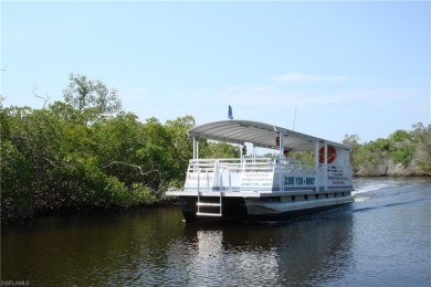 This tastefully updated and furnished end unit 3 bedroom condo on Pelican Sound Golf and River Club in Florida - for sale on GolfHomes.com, golf home, golf lot