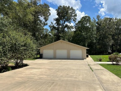 Welcome to a sophisticated retreat with a lodge-inspired charm on Quail Hallow Golf Course in Mississippi - for sale on GolfHomes.com, golf home, golf lot