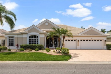 Nestled in the award winning Pelican Point Golf  Country Club on Pelican Pointe Golf and Country Club in Florida - for sale on GolfHomes.com, golf home, golf lot