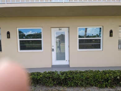 nice first floor unit.. vinyl flooring ...new range and on The American Golf Club in Florida - for sale on GolfHomes.com, golf home, golf lot