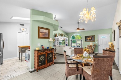 Welcome to this beautifully designed 3-bedroom, 2-bathroom home on Riviera Country Club in Florida - for sale on GolfHomes.com, golf home, golf lot