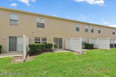 This condo features two bedrooms each with their own private on Golf Club At Fleming Island in Florida - for sale on GolfHomes.com, golf home, golf lot