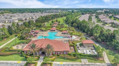 This condo features two bedrooms each with their own private on Golf Club At Fleming Island in Florida - for sale on GolfHomes.com, golf home, golf lot