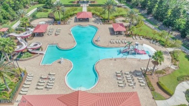 This condo features two bedrooms each with their own private on Golf Club At Fleming Island in Florida - for sale on GolfHomes.com, golf home, golf lot