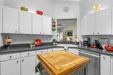 Welcome to this beautifully designed 3-bedroom, 2-bathroom home on Riviera Country Club in Florida - for sale on GolfHomes.com, golf home, golf lot