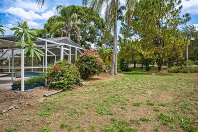 WATERFRONT POOL HOME in the heart of Westchase-area living! on Countryway Golf Course in Florida - for sale on GolfHomes.com, golf home, golf lot