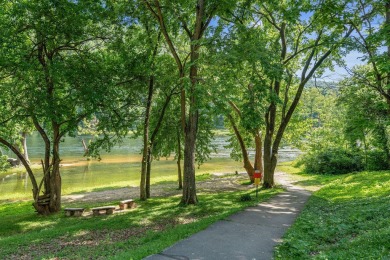 Step into one of the finest professionally decorated, golf-front on Pointe Royale Village Country Club in Missouri - for sale on GolfHomes.com, golf home, golf lot