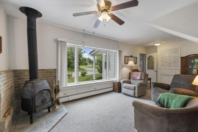 Welcome to this beautiful Colonial-style home located in the on Indian River Golf Club in Michigan - for sale on GolfHomes.com, golf home, golf lot