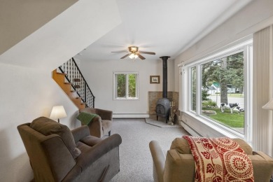 Welcome to this beautiful Colonial-style home located in the on Indian River Golf Club in Michigan - for sale on GolfHomes.com, golf home, golf lot