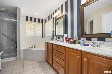 Welcome home to 4815 N. Weaverridge Boulevard! This 4-bedroom, 2 on WeaverRidge Golf Club in Illinois - for sale on GolfHomes.com, golf home, golf lot